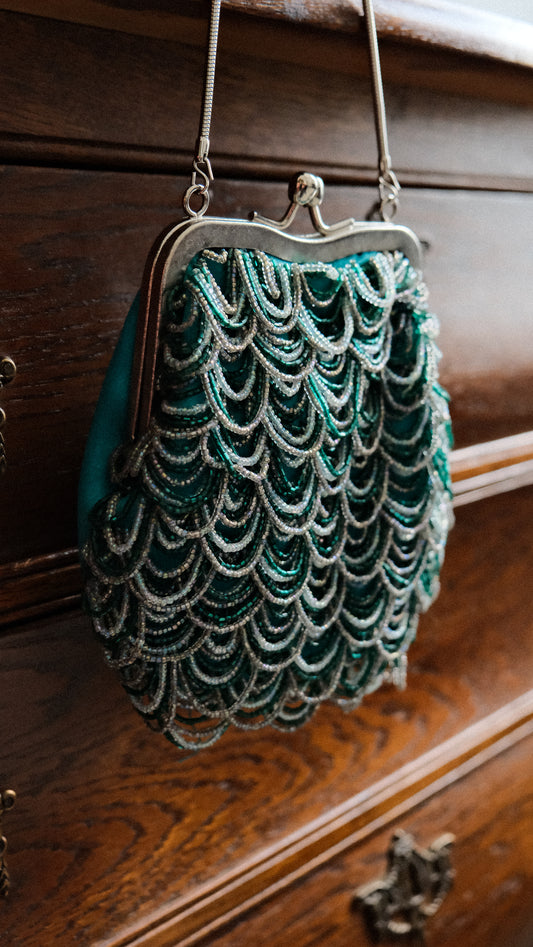 Teal siren clutch