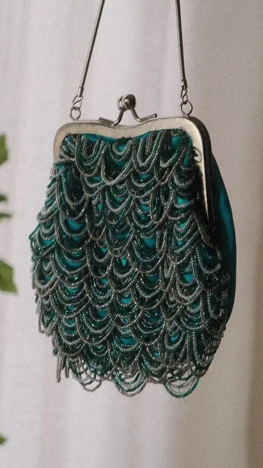 Teal siren clutch
