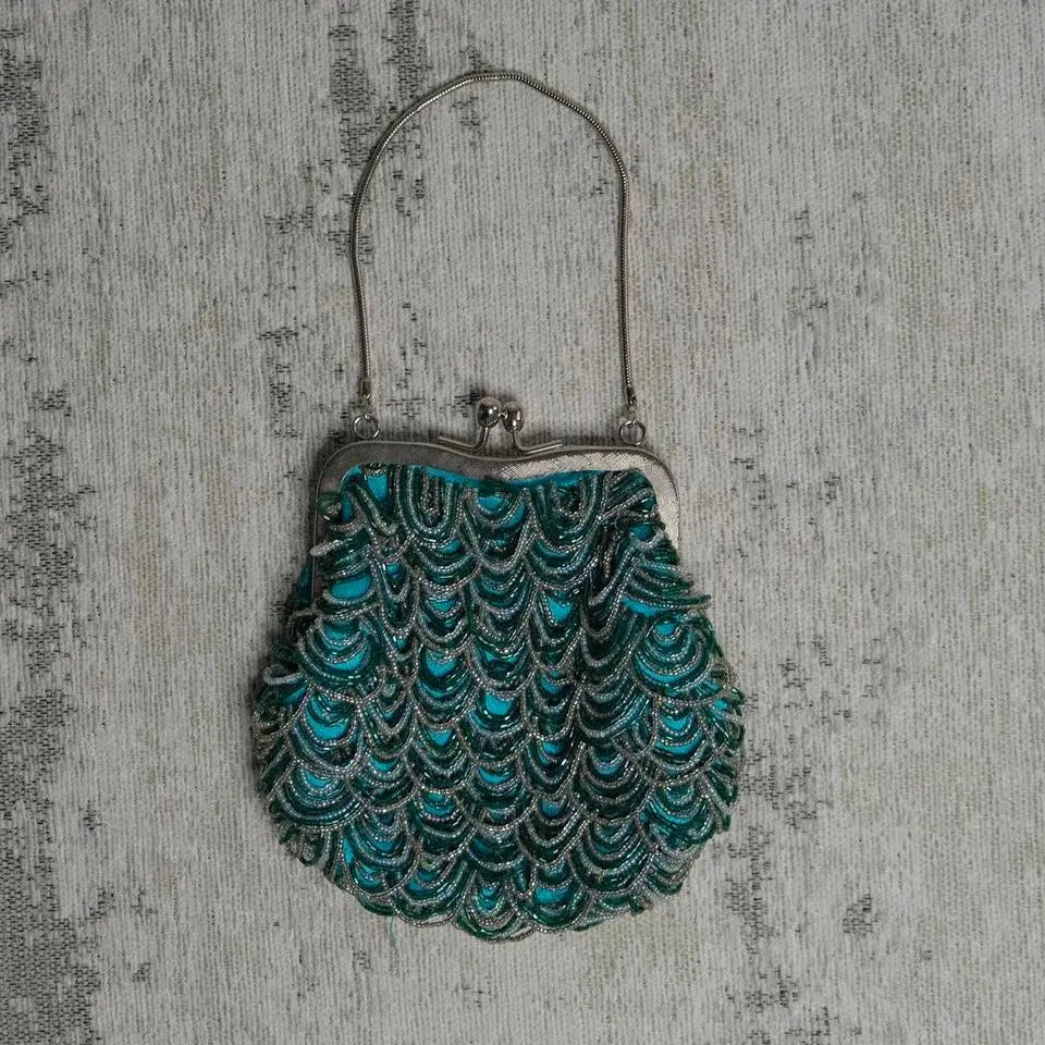 Teal siren clutch