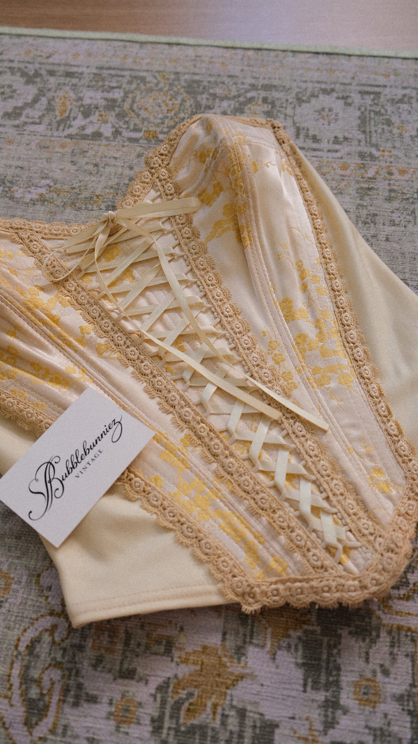 Vintage English designer creme bustier (S-M)