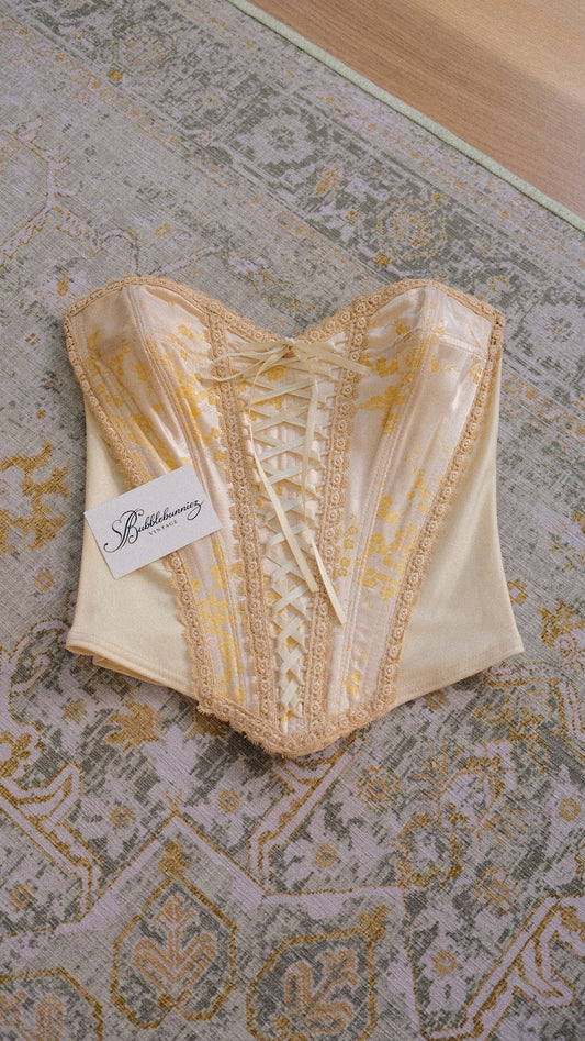 Vintage English designer creme bustier (S-M)