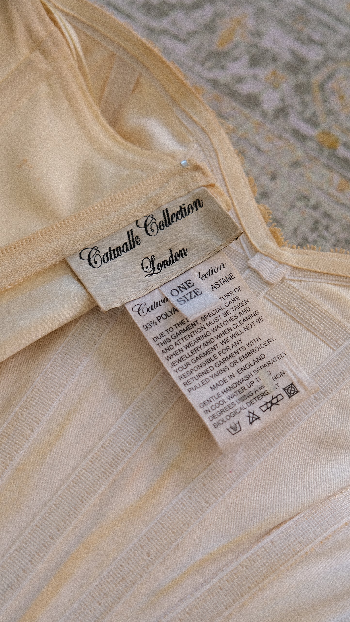 Vintage English designer creme bustier (S-M)