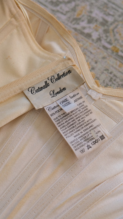 Vintage English designer creme bustier (S-M)
